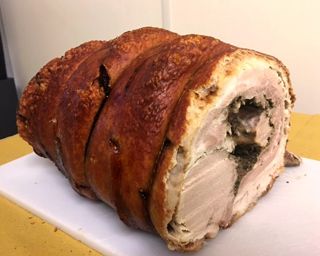 Cariani porchetta with crispy skin and tasty meat served cold on bread is something to love. Italian-style roast pork